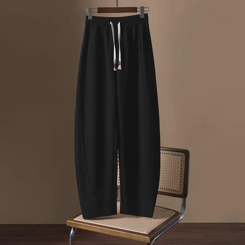 "European Niche Design Loose Casual Women's Pants: Slim, All-Match, Spring/Autumn Banana & Sickle Sweatpants"
