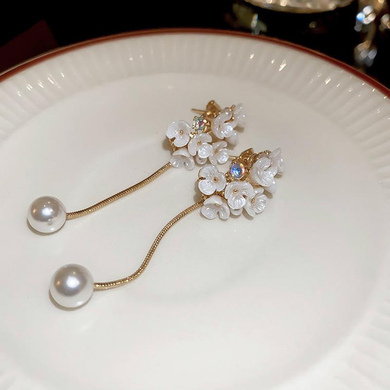 

Модные белые серьги-ракушки с цветком и темпераментом, новые серьги, европейские и американские модные серьги высокого класса