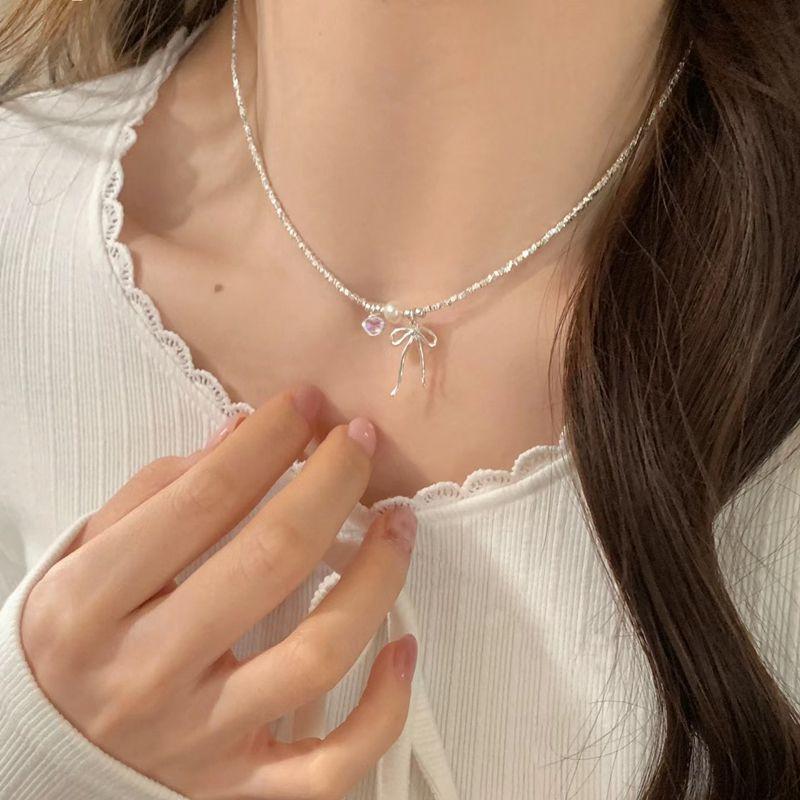 Broken silver bow pearl necklace light luxury niche high-end clavicle chain new neck chain accessories women's models