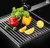 Roll-up drainer for the sink