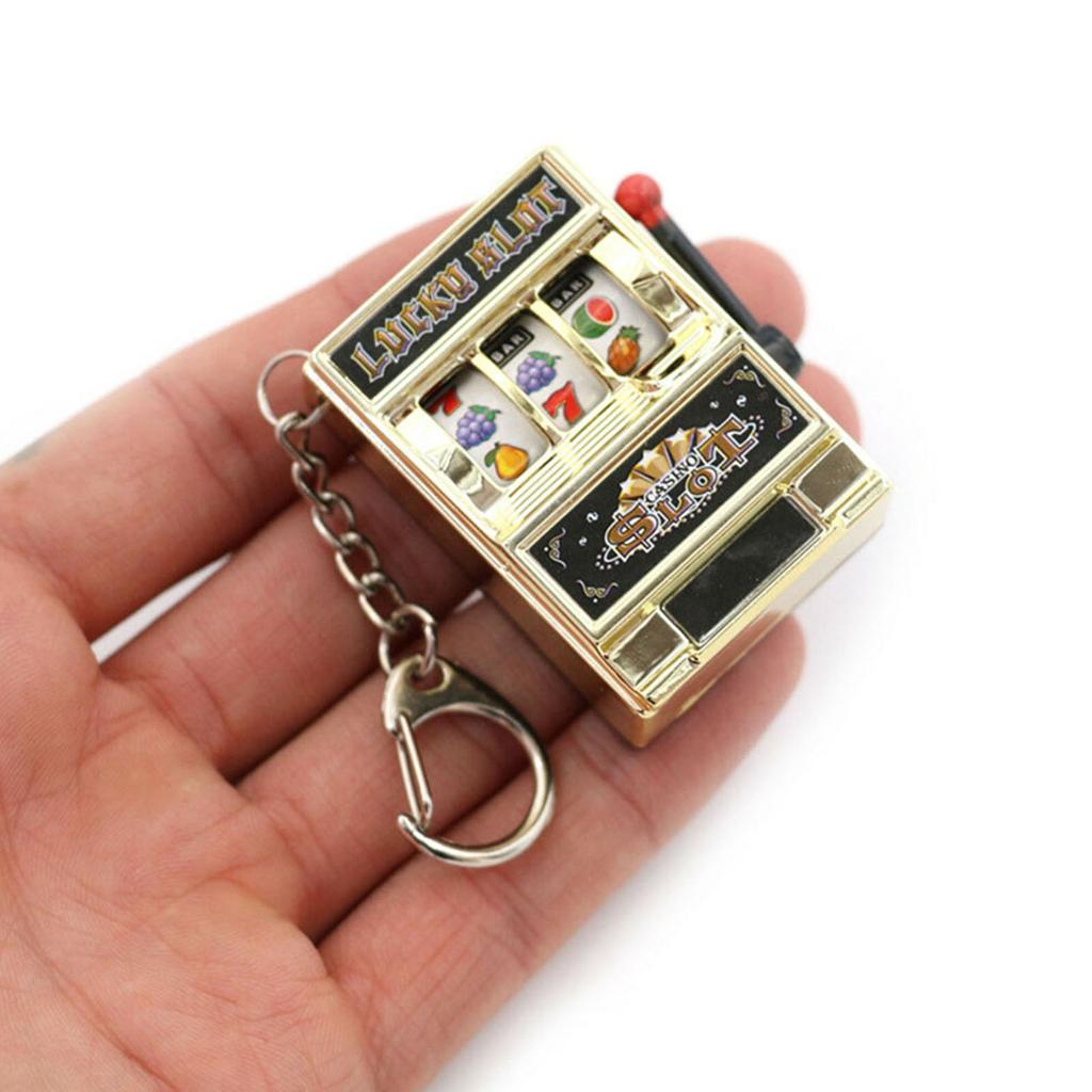 Portachiavi mini slot machine con campanella Divertente ciondolo da casinò Portafortuna Portachiavi con jackpot Portachiavi con ciondoli per borse Regali per feste