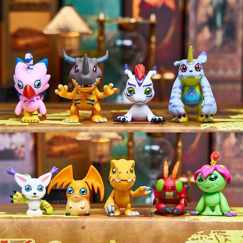 9-piece set of cute Japanese Digimon Adventure anime figures, including Agumon, Patamon, and Gabumon. PVC tabletop figurines.