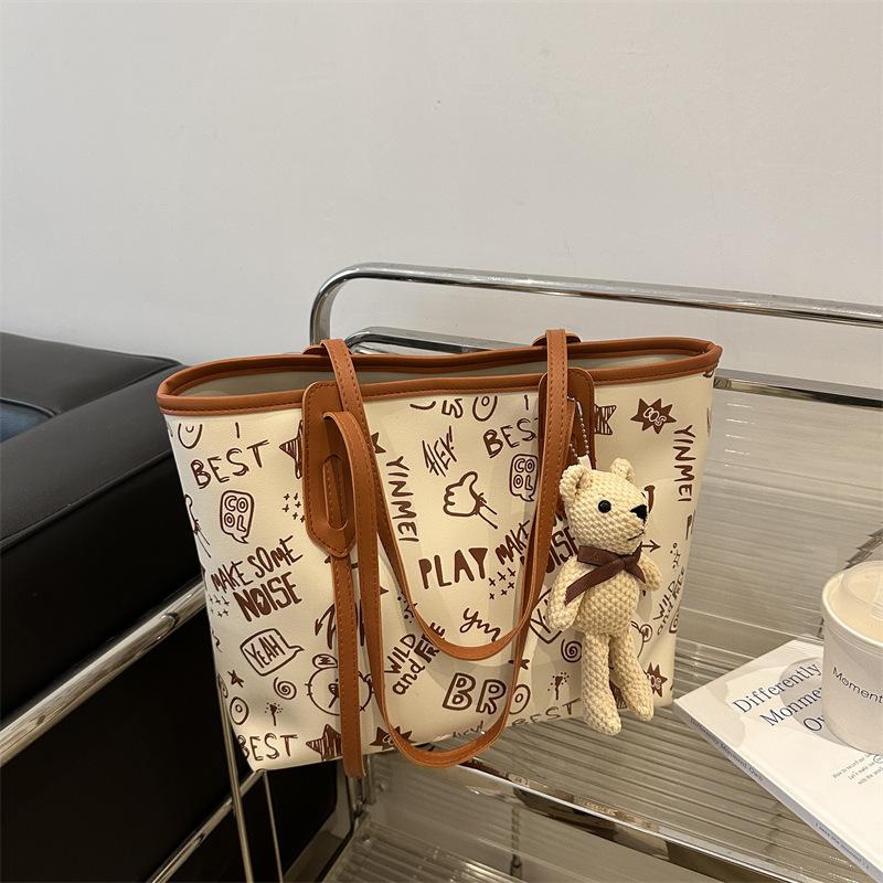 Einfache Temperament große Kapazität Tragetasche Damen 2025 Sommer neu kleine frische Druck Schulter Computertasche