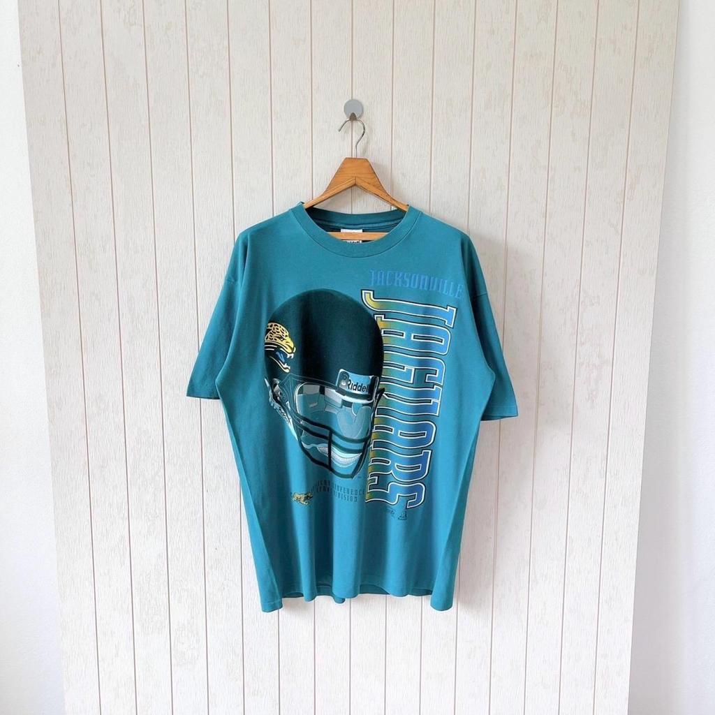 Vintage 90s Jacksonville Jaguars T-Shirt - NFL football: Riddell made in USA/ size L