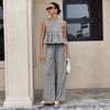 Completo da donna con crop top senza maniche a quadretti Vichy e pantaloni a gamba larga