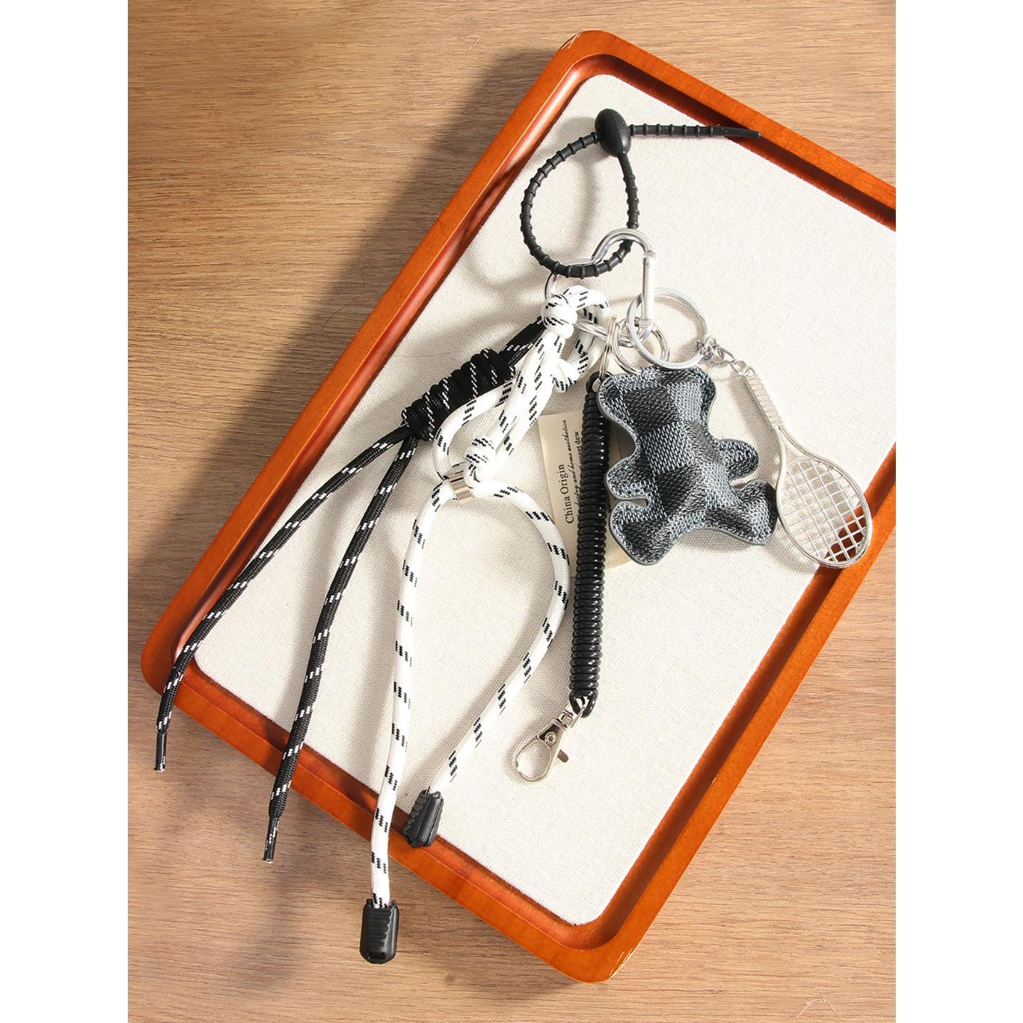 

Creative fashion leather bear alloy tennis racket handwoven rope pendant bag pendant mobile phone lanyard сірий колір
