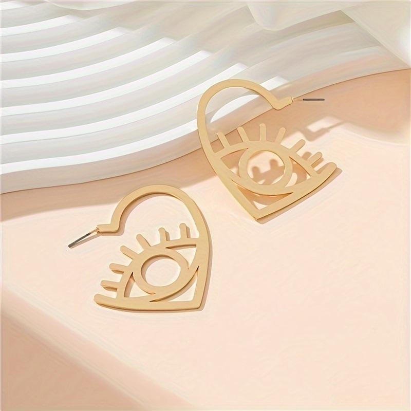 

A pair of trendy hollow design love eye elements retro luxury simple fashion temperament stud earrings