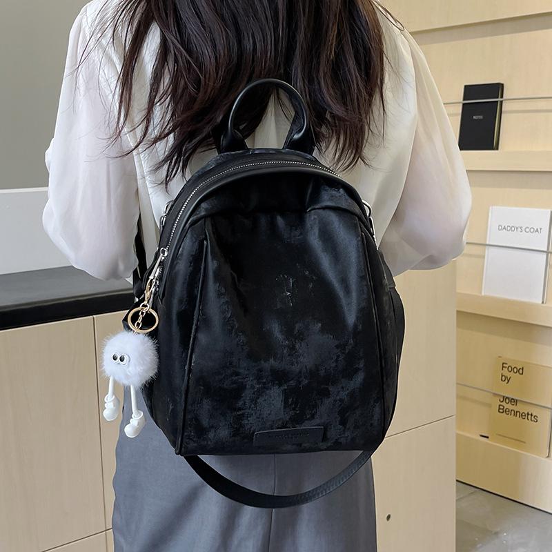 Trendy 2025 Women's Waterproof Large Travel Backpack for College and Office