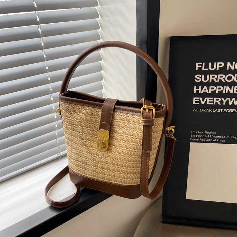 Tragbare kontrastierende gewebte Tasche Damenmode Bucket Bag Nische schlichte lässige Textur Umhängetasche