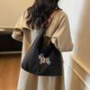 Korean version of commuter large-capacity canvas bag women's 2025 autumn new literary style simple fashion cartoon shoulder bag
