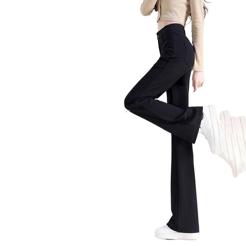 Černé zvonové kalhoty s vysokým pasem: Zeštíhlující rozšířené kalhoty na jaro a podzim.