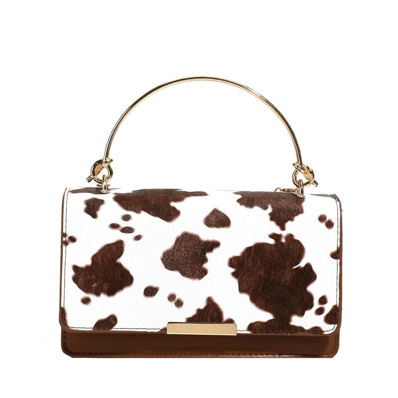 

European and American retro fashion cow pattern handbag bag women s summer new texture commuter shoulder oblique span bag