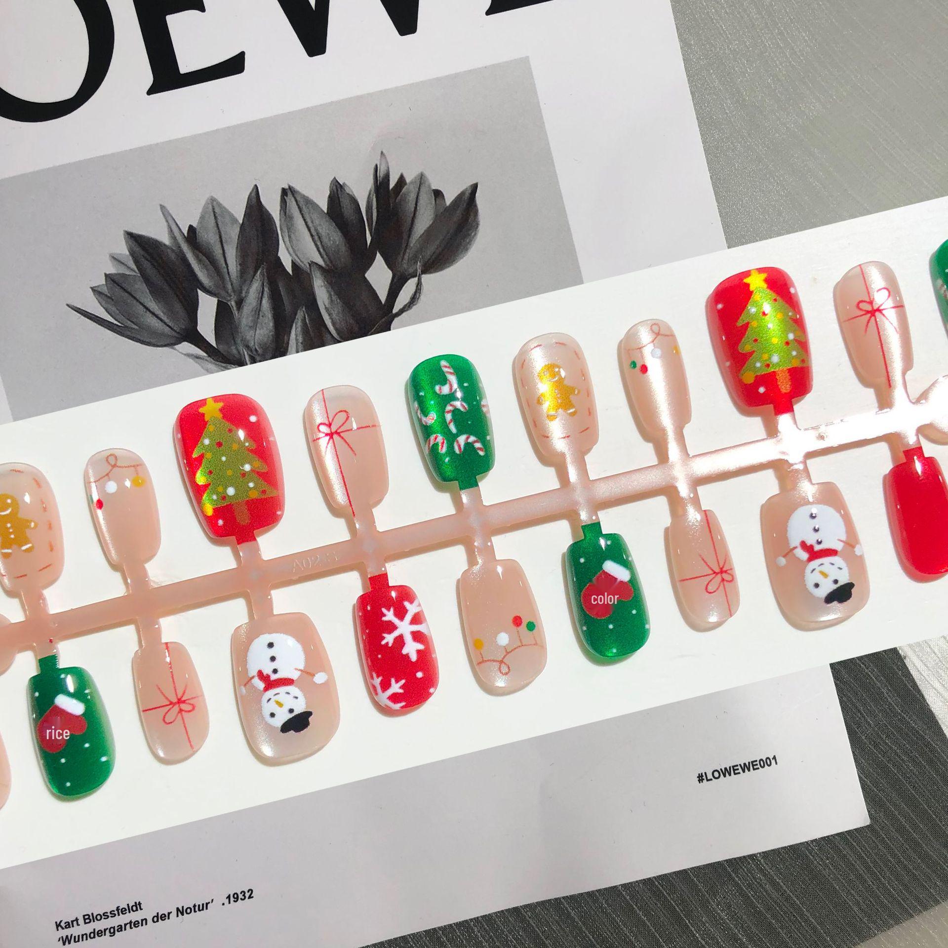 

30-Piece Green Christmas Nail Art Set: Cat Eye, Snowman & Tree Designs