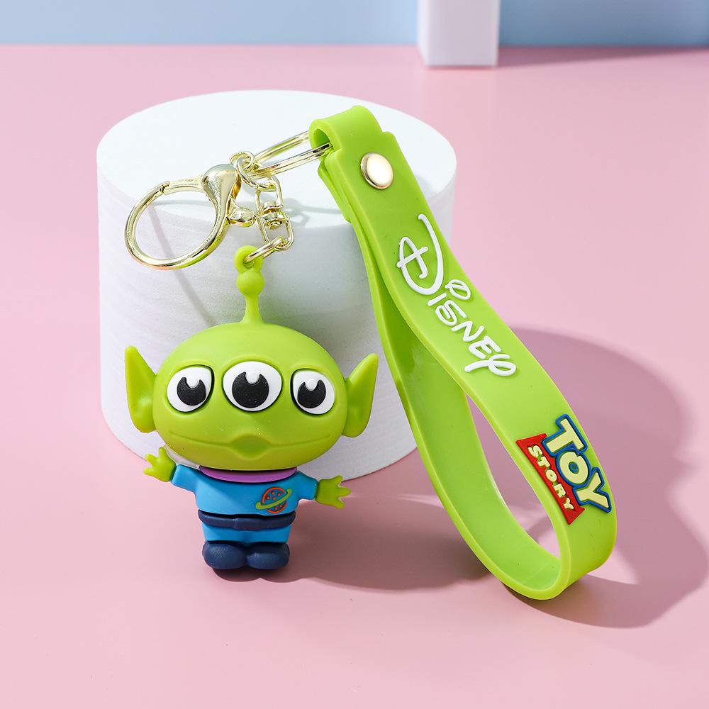 Best-Selling Toy Story Figures Keychain: Three-Eyed Alien, Buzz Lightyear, and Strawberry Bear Charms