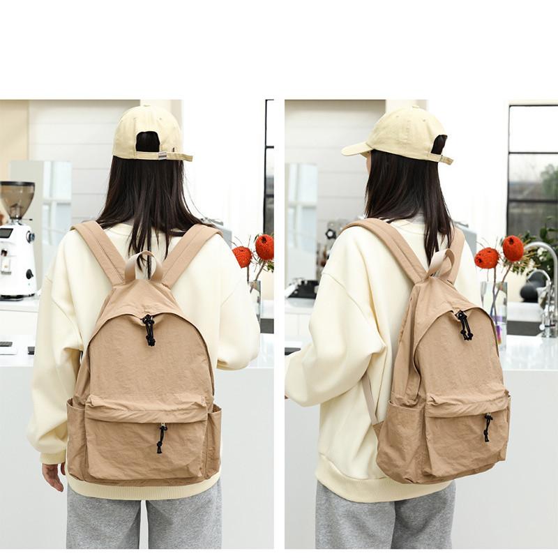 IELGY Japanese casual literary canvas schoolbag, simple washing water and old backpack, khaki fashion nylon backpack.