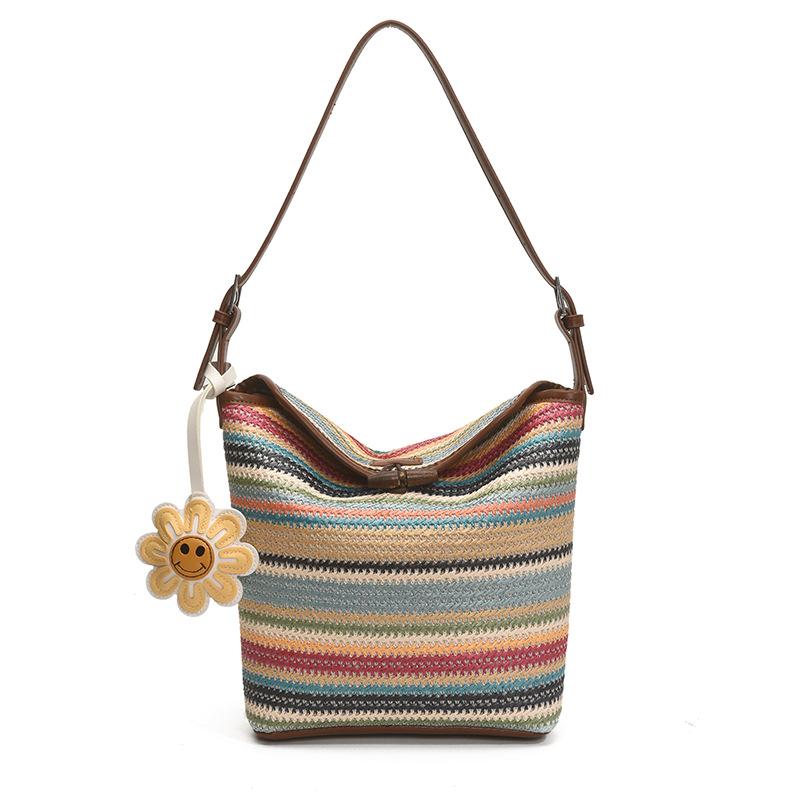 Design sense bag women's summer contrasting color striped woven bag large capacity leisure vacation bucket bag