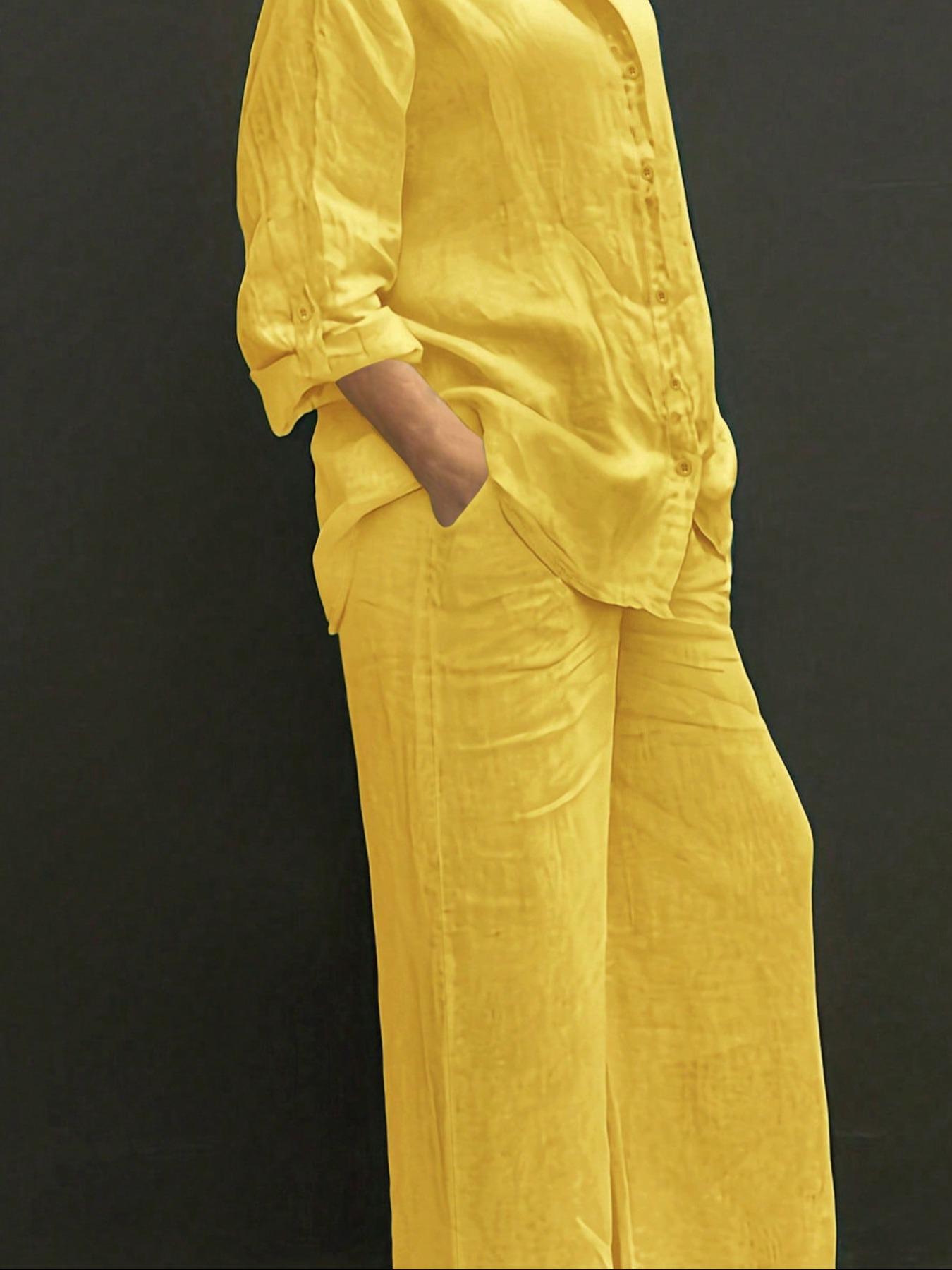 

Комплект рубашки с длинным рукавом и брюк L