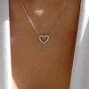 A Pendant Necklace for Women with a Rhinestone-embellished Hollow Heart Design for Valentine's Day
