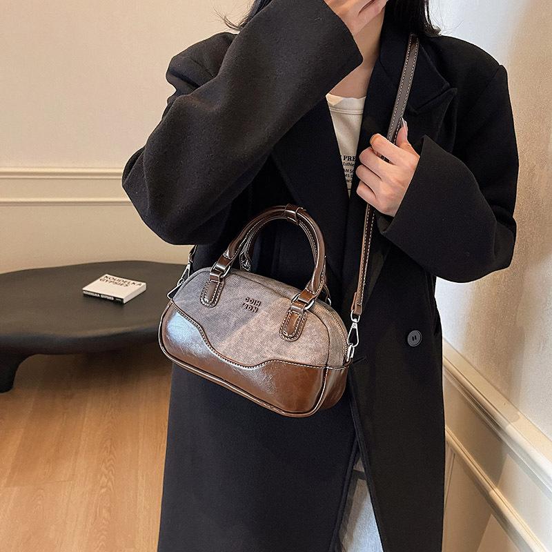 Premium sense retro contrasting color portable bowling bag women 2025 new trendy shoulder bag versatile messenger bag