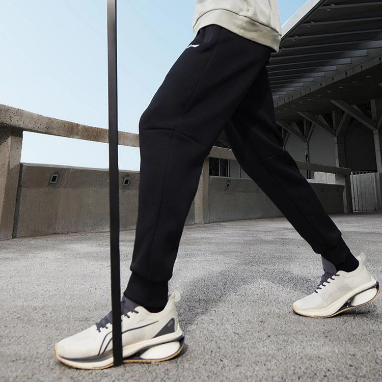 Li Ning Fitness Series Solid Color Non-Stretch Mid-Waist Tapered Knit Sports Pants Men Bottoms Black AKLT439-1