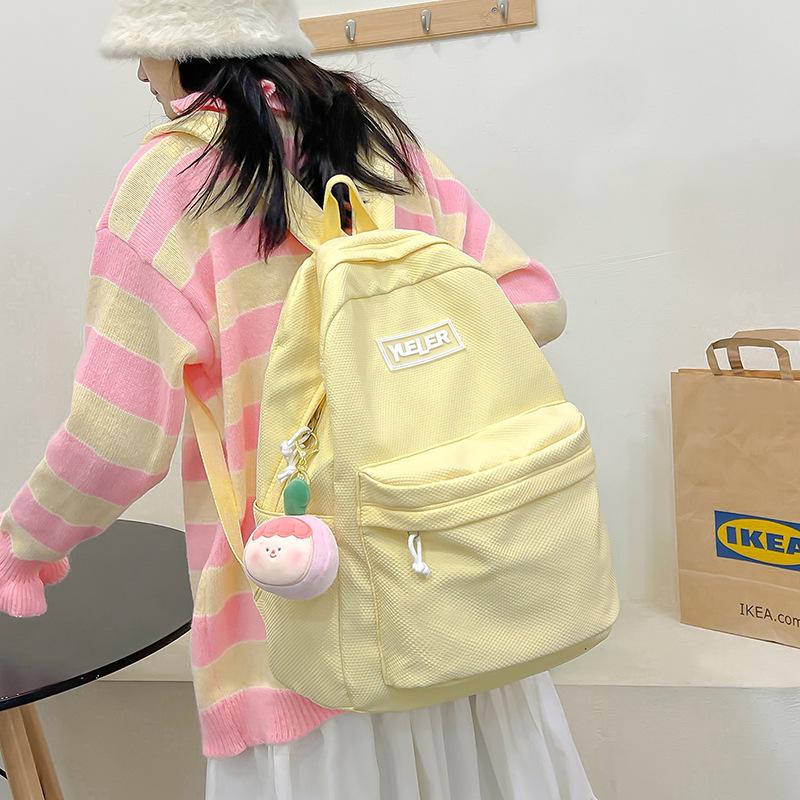 Student backpack Women's new large-capacity outdoor lightweight schoolbag Middle school student candy-colored backpack