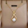 A women's fashion necklace with a faux pearl pendant,Versatile light luxury ocean style design necklace and earrings