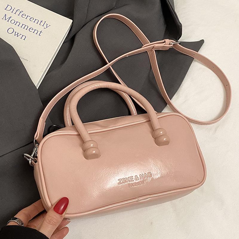 Korean Version of Fashionable Simple Retro Solid Color Portable Boston Bag Casual Versatile Solid Color Commuting Foreign Style Messenger Women's Bag