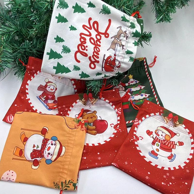 Christmas Eve Drawstring Gift Bag with Cartoon Snowman, Bear, and Santa Patterns