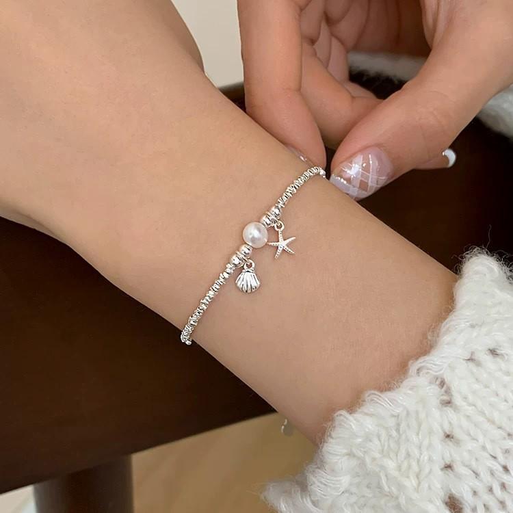 Elegant Starfish Seashell Pearl Bracelet for Women - Versatile, Fashionable Bangle with High-End Appeal