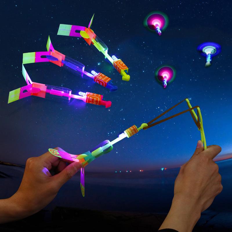 

Детские игрушки Светодиодные вверх свечение катапульты стрелки детей Plaything ночь мигать Полет стрекозы