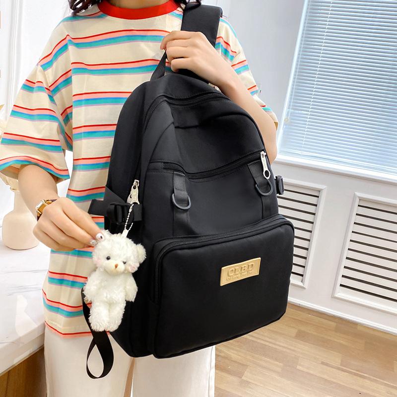 School season new student schoolbag Korean version casual large capacity junior high school campus schoolbag large capacity computer backpack