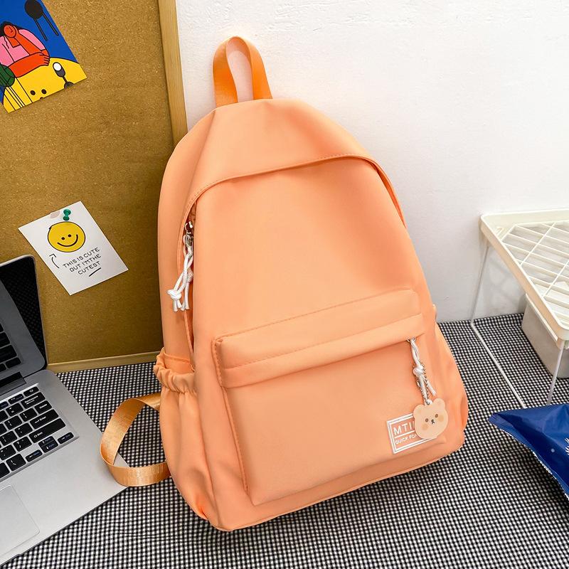 Small fresh girl backpack Japanese solid color schoolbag female Korean version ins versatile large capacity student backpack new
