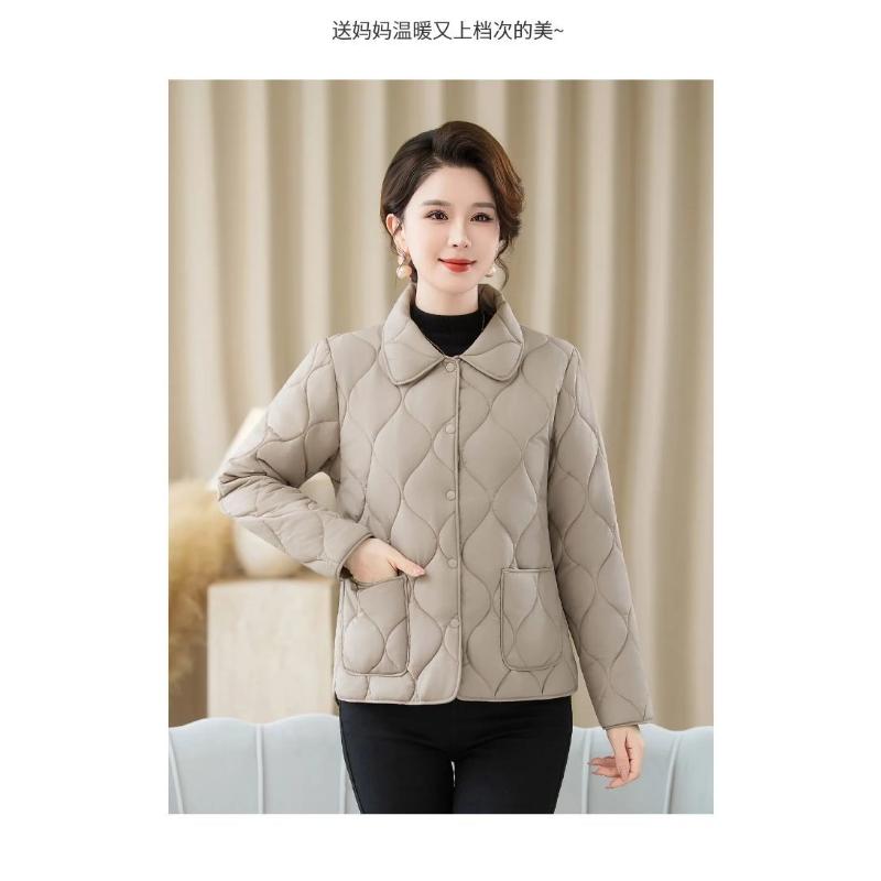 Nya Höst- och Vinter Dam Spliced Revers Knapp Ficka Mode Enfärgad Mångsidig Casual Långärmad Parkas