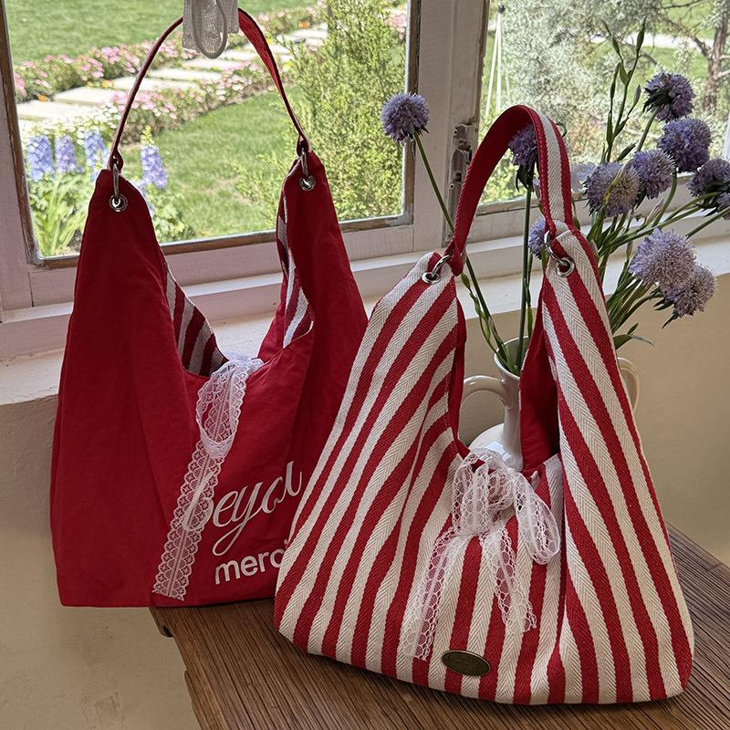 

Striped canvas bag women s summer 2025 new trendy Korean letter printing double-sided shoulder bag student class bag