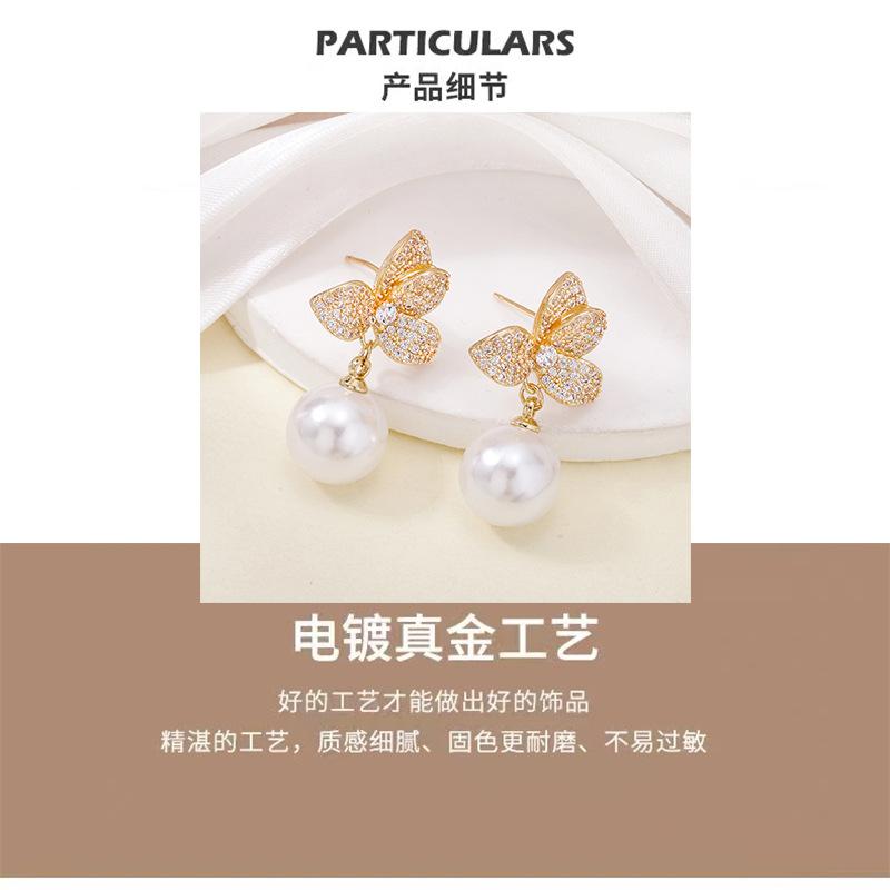 New fashion temperament pearl pendant full of diamonds flower stud earrings high-end niche design literary and artistic fan earrings earrings