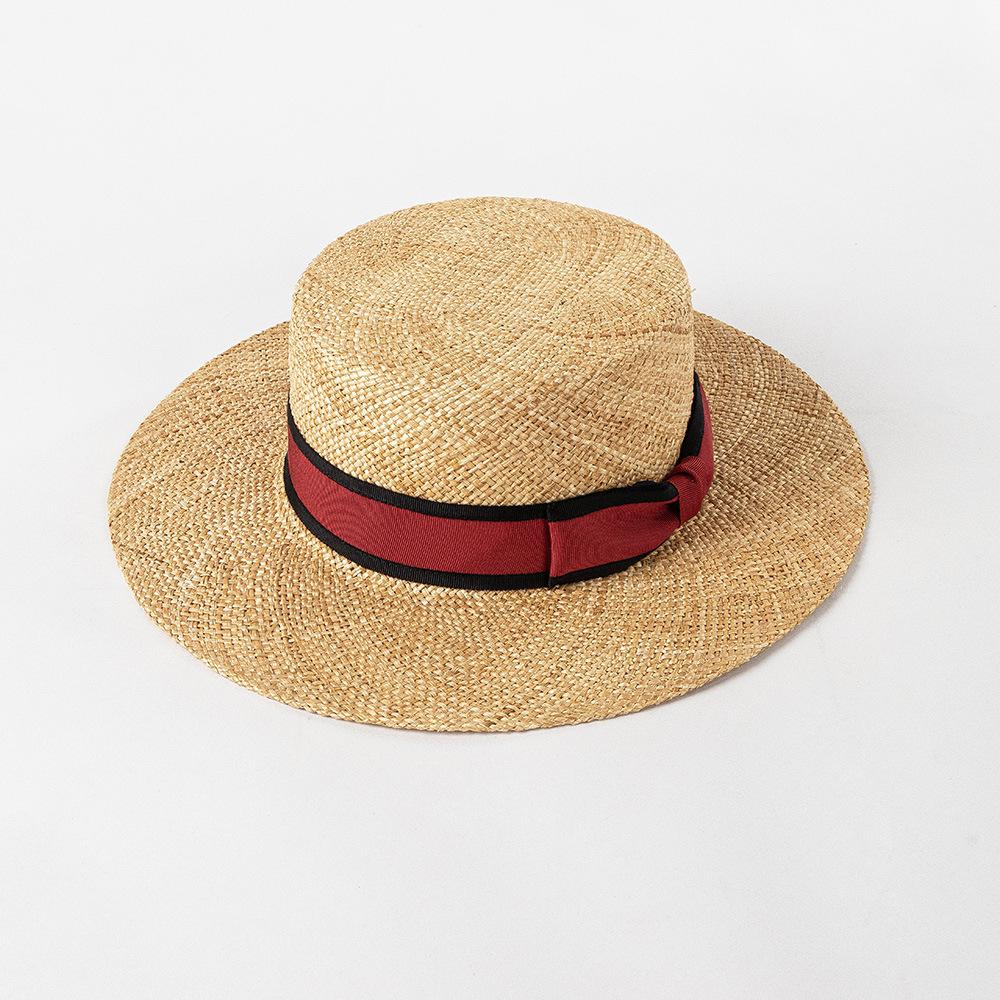 Spring and summer new fashion two-color webbing bow treasure grass wide brim flat top hat outdoor shopping sun protection straw hat
