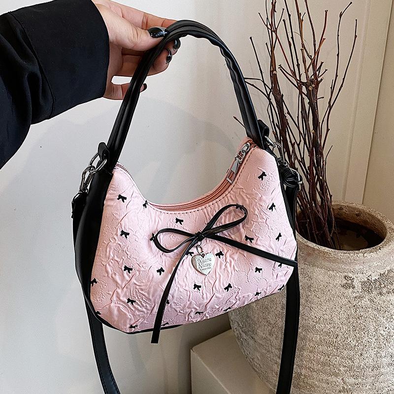 

Корейская нишевая сумка-багет подмышку женская 2025 модная универсальная сумочка в иностранном стиле универсальная на плечо или через плечо розовый