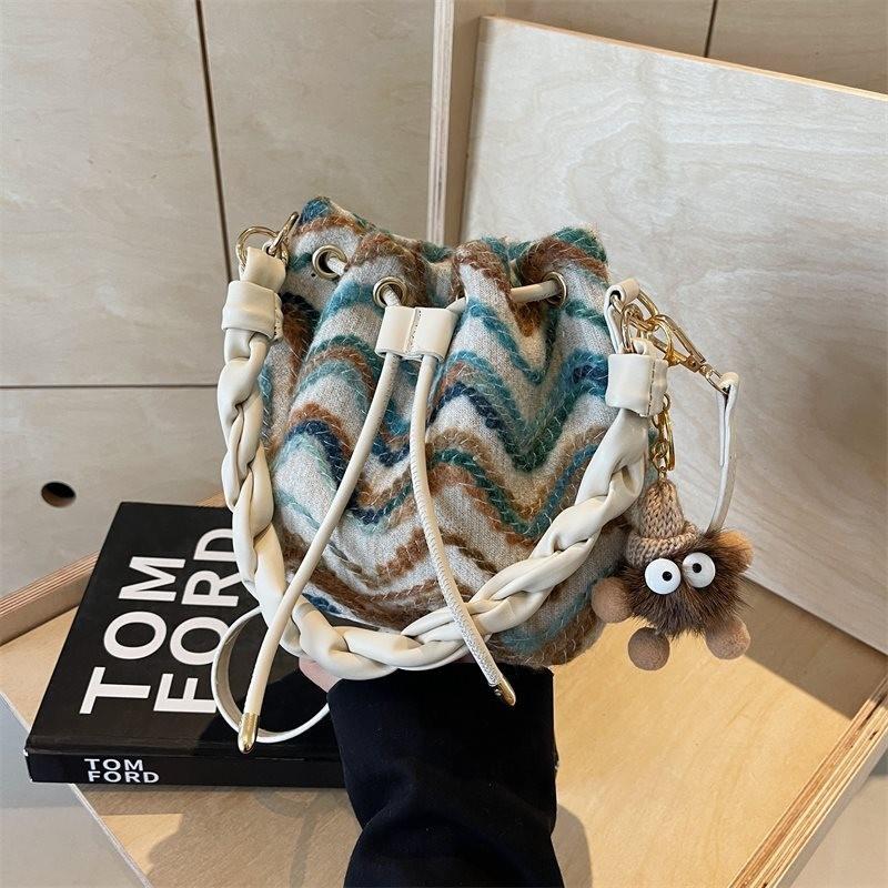 

Stylish Bohemian Handheld Bucket Bag For Women With High-end Chic Design OffWhite with Pendant