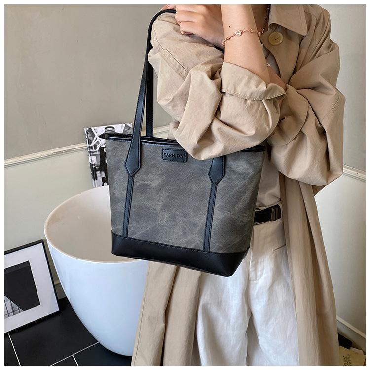 Spacious Faux Leather Bucket Tote Bag for Women Trendy Single Shoulder Commuter Handbag Fashionable Daily Purse
