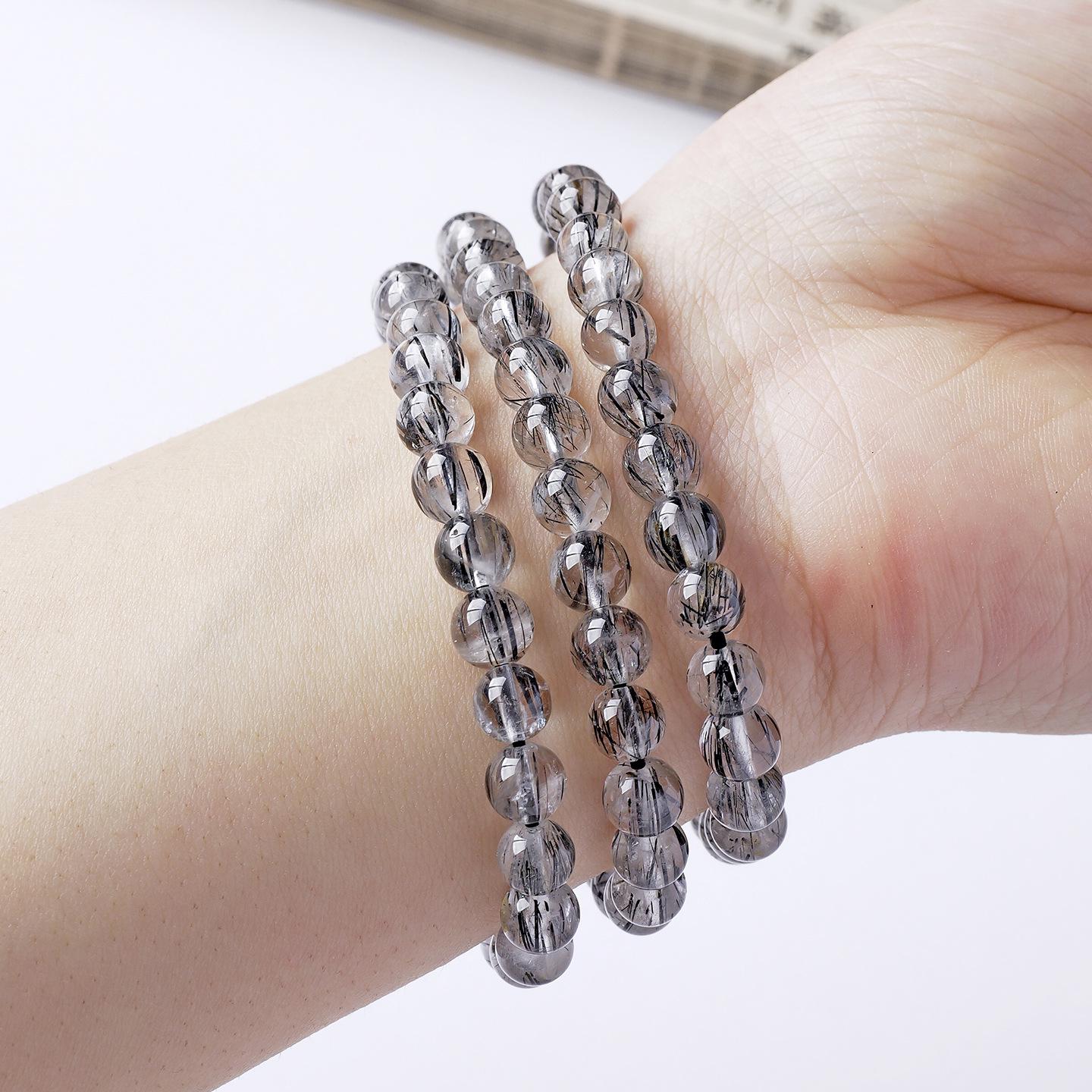 

Runya Crystal Black Rutilated Quartz Bracelet - Natural Brazilian Clear Ice Type Beads 6~6.8mm Single Strand (~30 beads)