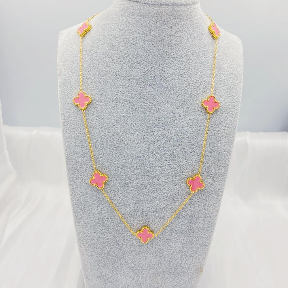 Collier de fleurs de trèfle à quatre feuilles pour la mode féminine, tempérament de luxe léger, chaîne de pull haut de gamme à sept fleurs