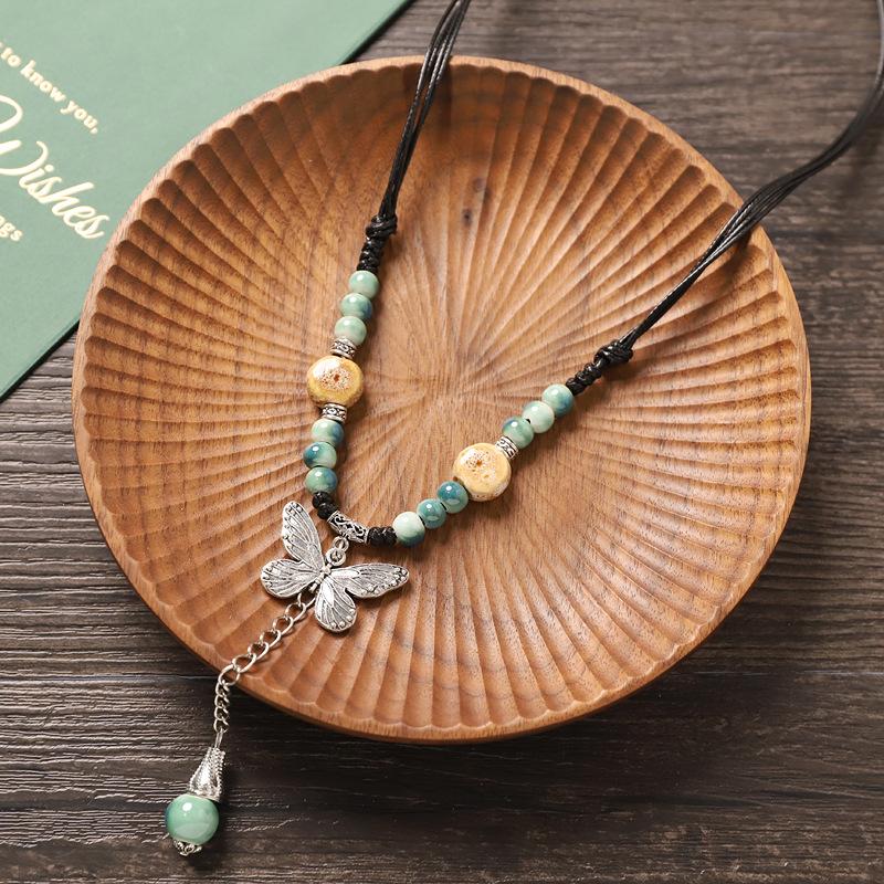 

Literary retro ceramic butterfly necklace women s high-end pendant niche simple accessories