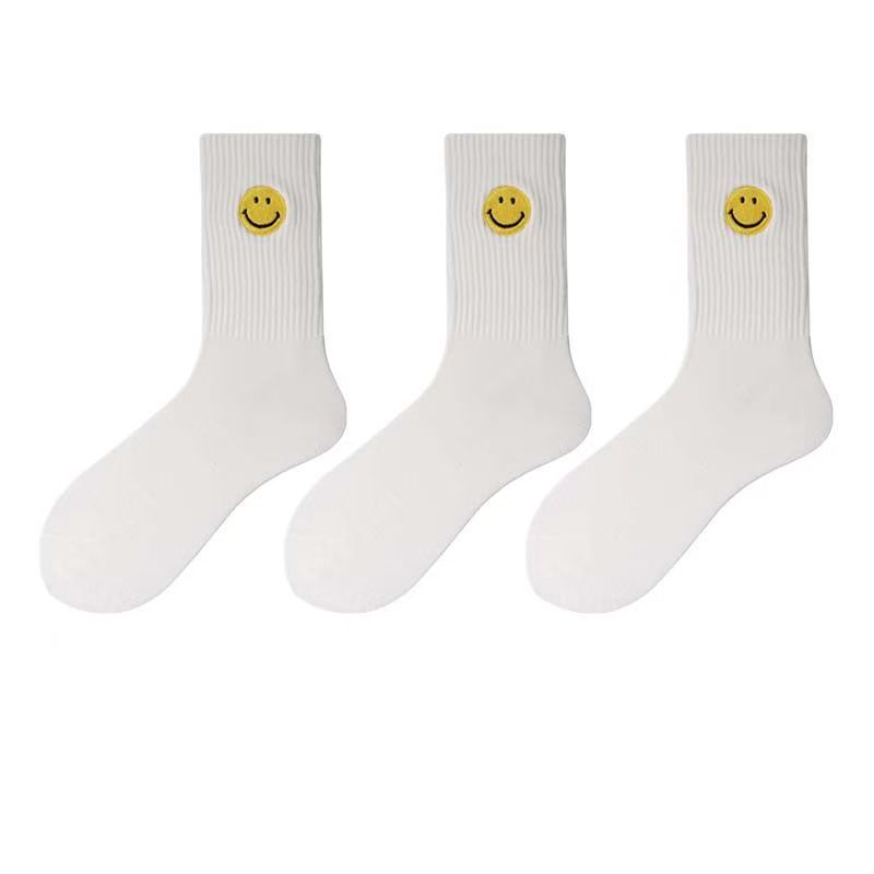 Einfarbige, mittellange Socken mit frischem, lächelndem Gesichtsmuster, schlichtem Design, bequem und atmungsaktiv.