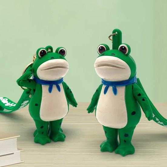 מחזיק מפתחות צפרדע מצדיע קישור כפתור ידיים מרקם ריאליסטי צעיף כחול מחזיק מפתחות צפרדע מיני נייד אבזם לובסטר תליון לתרמיל