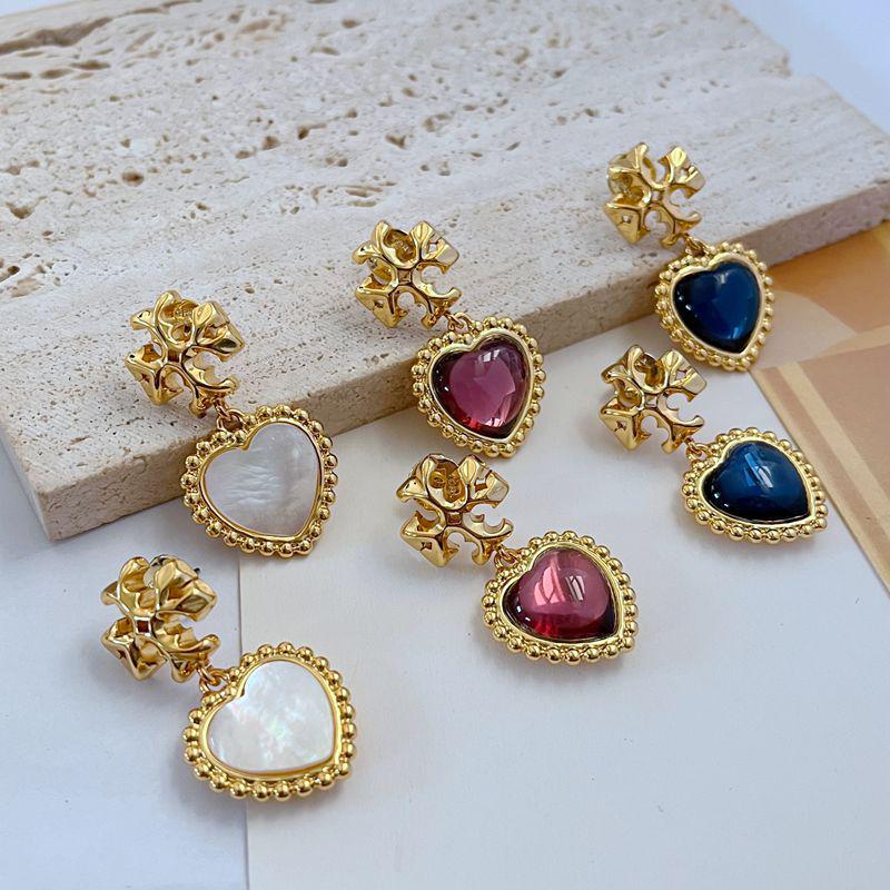 

European & American Fashion Luxurious Heart Shell Metal Earrings for Women белый