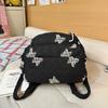 Butterfly Embroidery Backpack Casual Daily Bag Large Capacity School Bag for Students Commuters Minimalist Fashion Design with Tassel Details