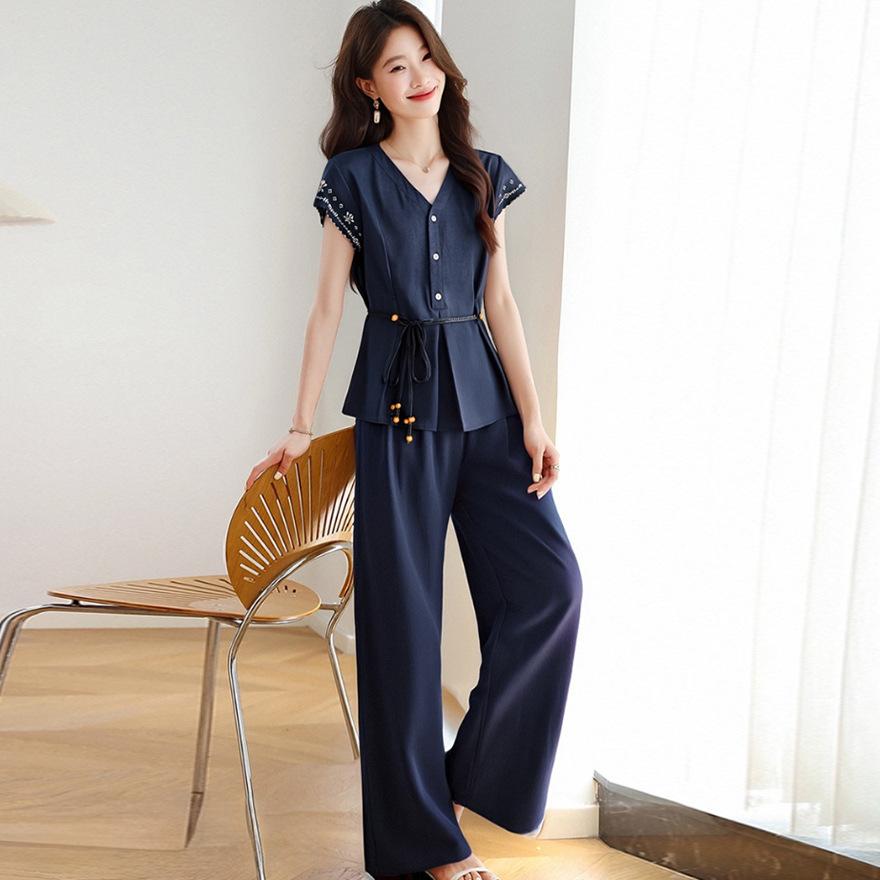 

Модный женский костюм новый темперамент V-образный вырез тяжелая промышленность вышитый топ брюки клеш костюм-двойка XXL