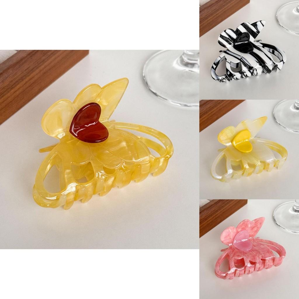 Dorei Accessories Snygg Hårklämma i Acetat med Hjärta och Fjäril för Eleganta Uppläggningar