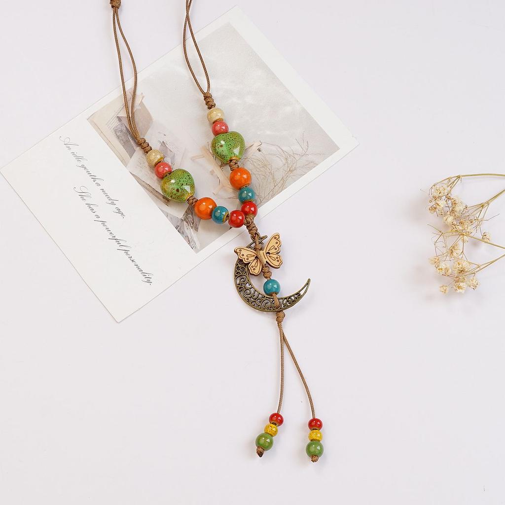 Ethnic style ceramic butterfly bell pendant necklace design sense new trendy long sweater chain
