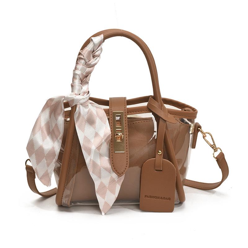 

Transparent jelly bag summer new fashion shoulder messenger bag versatile portable bucket bag темно-коричневого